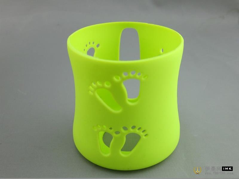 Silicone cup holder for children. PNG